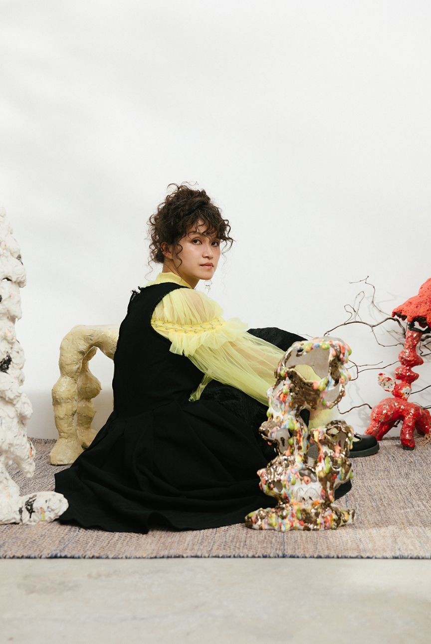 a person sitting on a couch a person sitting on a couch