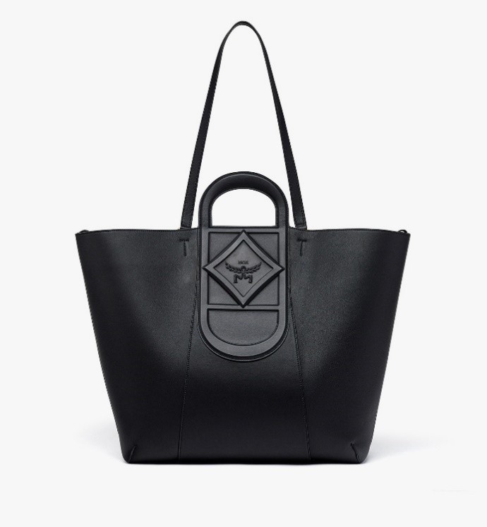 Ein Bild, das Zubehör, Tasche, Handtasche, Schultertasche enthält. Automatisch generierte Beschreibung