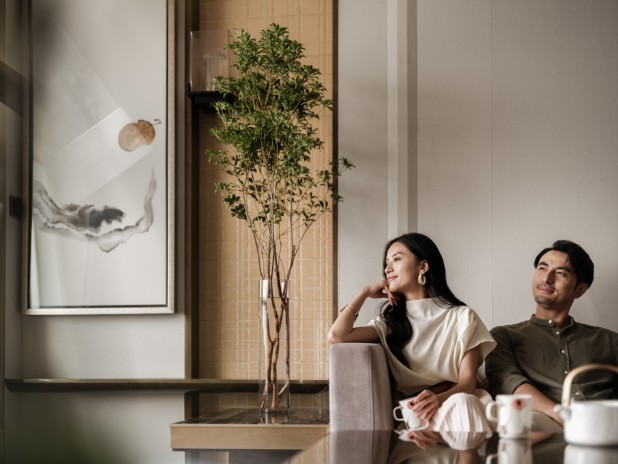 A person and person sitting on a couch AI-generated content may be incorrect.