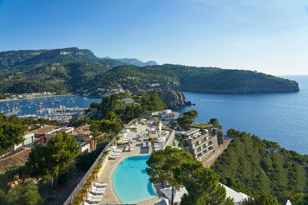 A swimming pool next to a body of water AI-generated content may be incorrect.